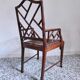 Fauteuil asiatique canné en bois à l'imitation du bambou
