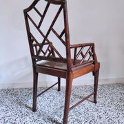 Asian canine armchair in wood in imitation of bamboo