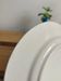 Small opaque porcelain dessert plate