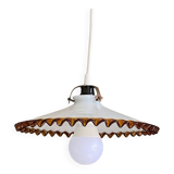 Old pendant light with a white opaline glass shade and a wavy border.