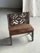 Mini bench with carved backrest featuring a rosette pattern and scrolls H59 W51