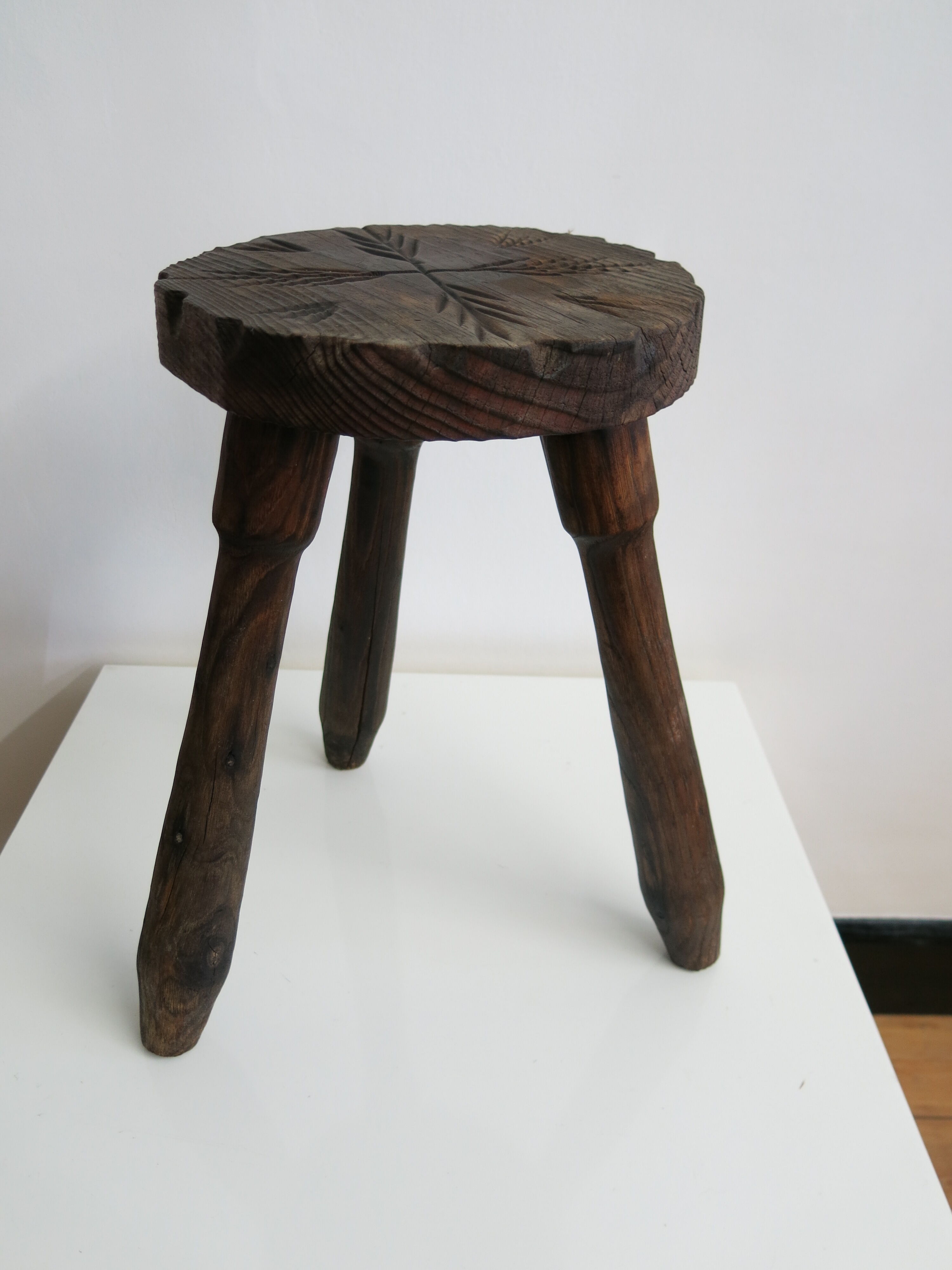 Carved wooden stool