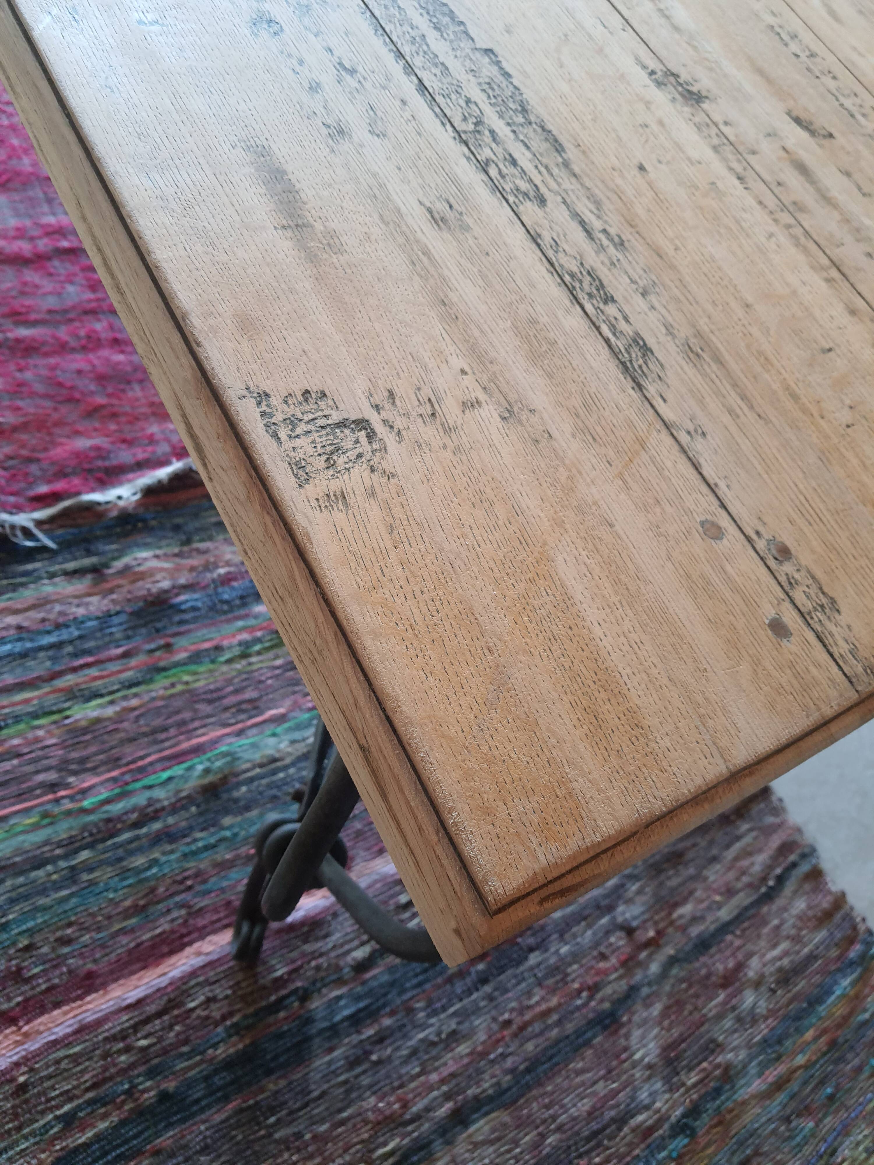 Wooden and wrought iron table