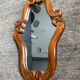 Miroir vintage en bois sculpté