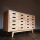 Merchandising chest of drawers by James Leonard Esavian