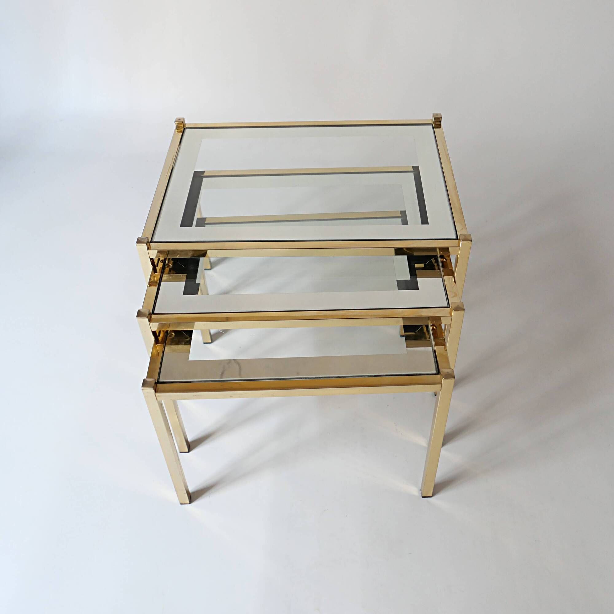 nesting tables in gold metal and mirror vintage 1970s design