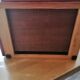 Wooden and fabric footrest with 2 drawers and book rack
