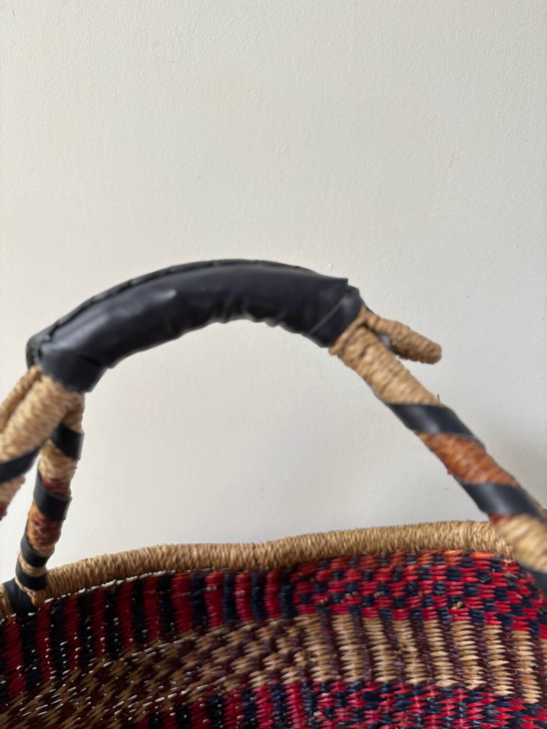 Vintage colorful woven rush ethnic basket