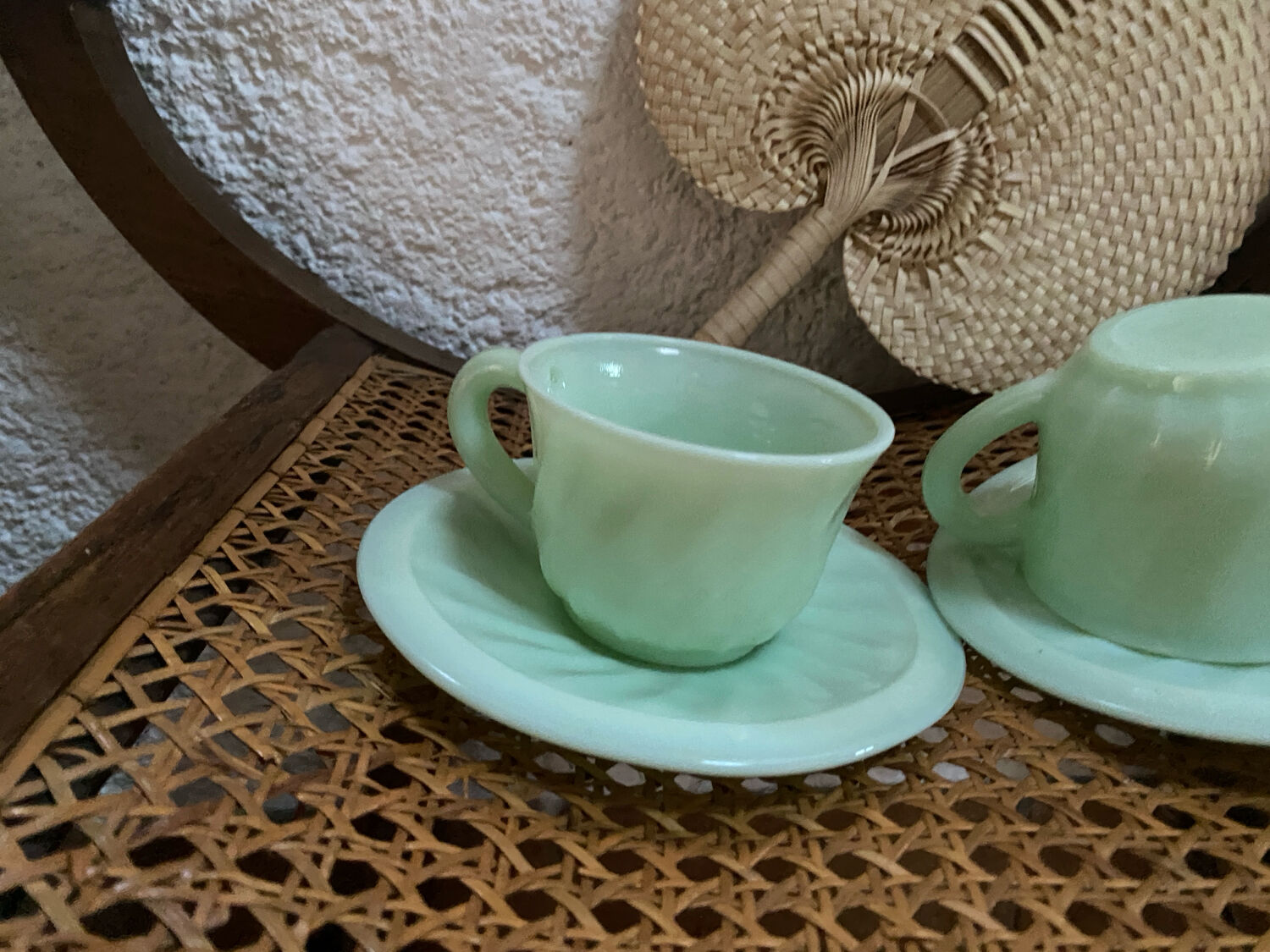 A pair of antique opaline coffee cups.