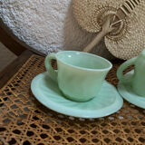 A pair of antique opaline coffee cups.