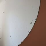 Large vintage chiseled round mirror