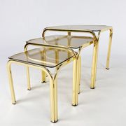 Tables gigognes en laiton et verre fumé, années 1970