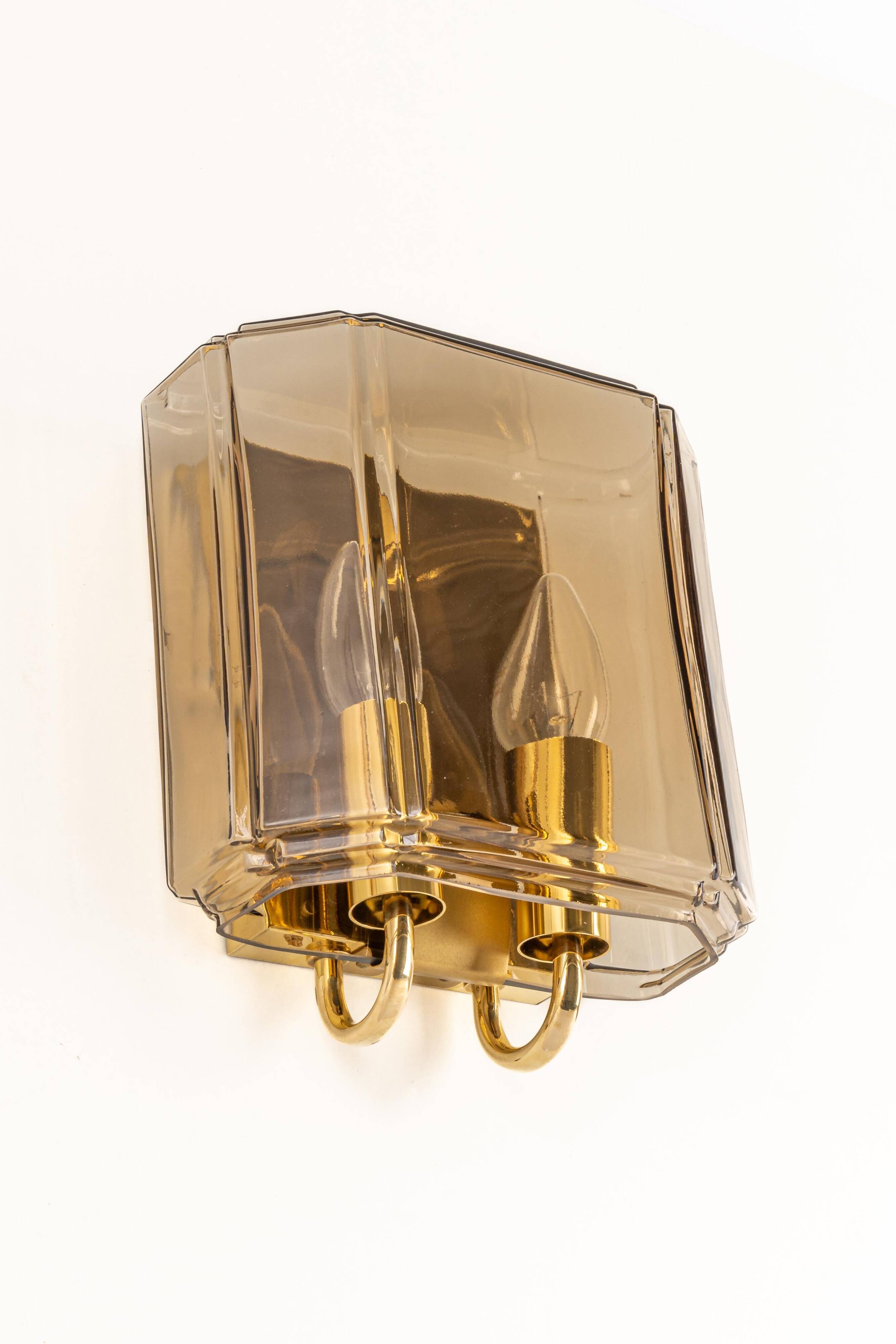 Large smoked glass wall sconces by Limburg, Germany.