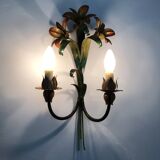 Large pair of vintage sconces in painted metal in the shape of a fleur-de-lis and foliage. 1970s