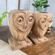 Pair of wooden "owl" candlesticks