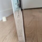 Knoll coffee table with smoked glass top and chrome metal.