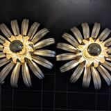Golden metal flower sconces