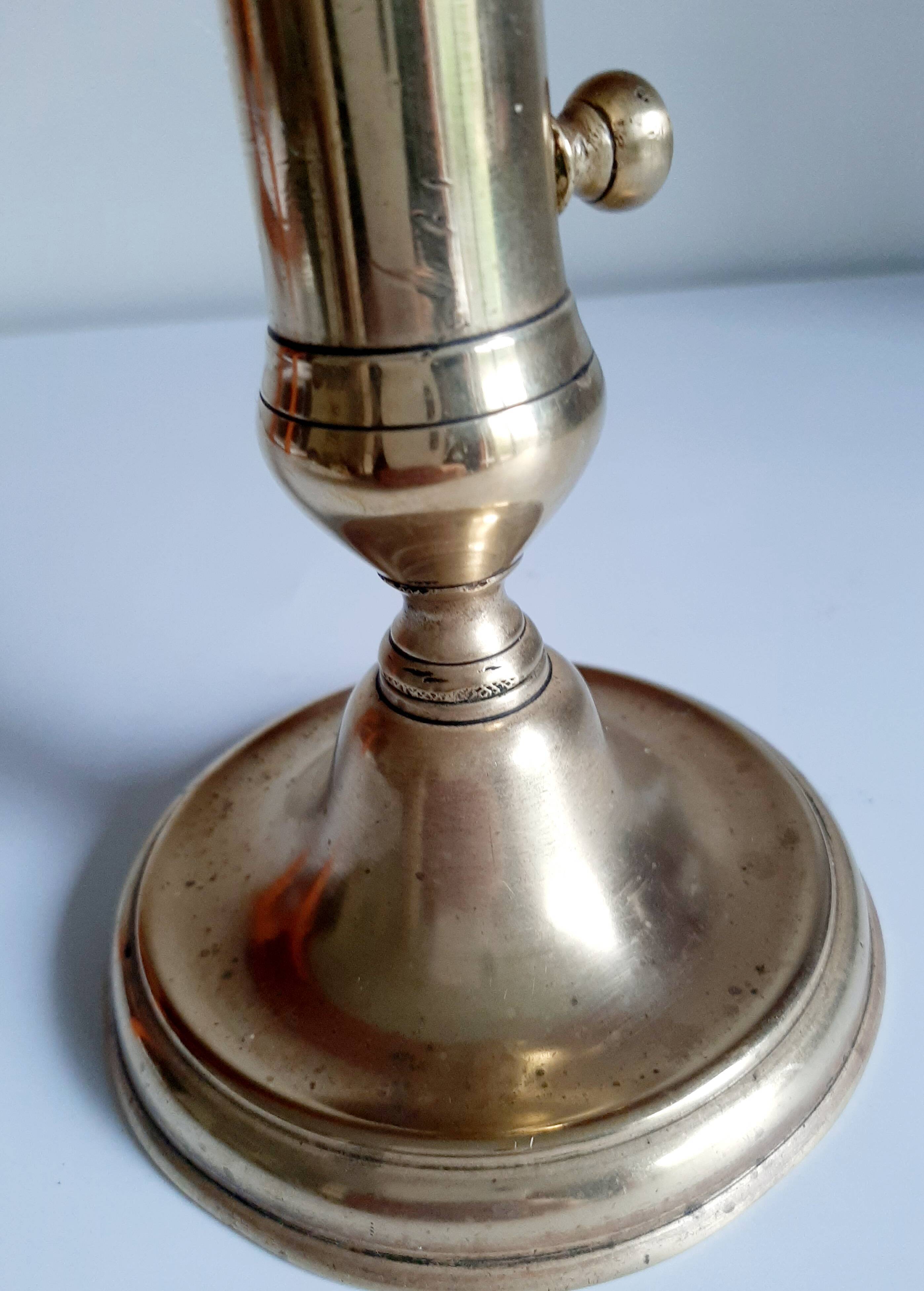 Golden brass candle holder