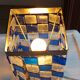 1970s designer table lamp with blue and clear plexiglass pendants.