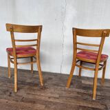 Pair of chairs in light wood and vintage red fabric 1960