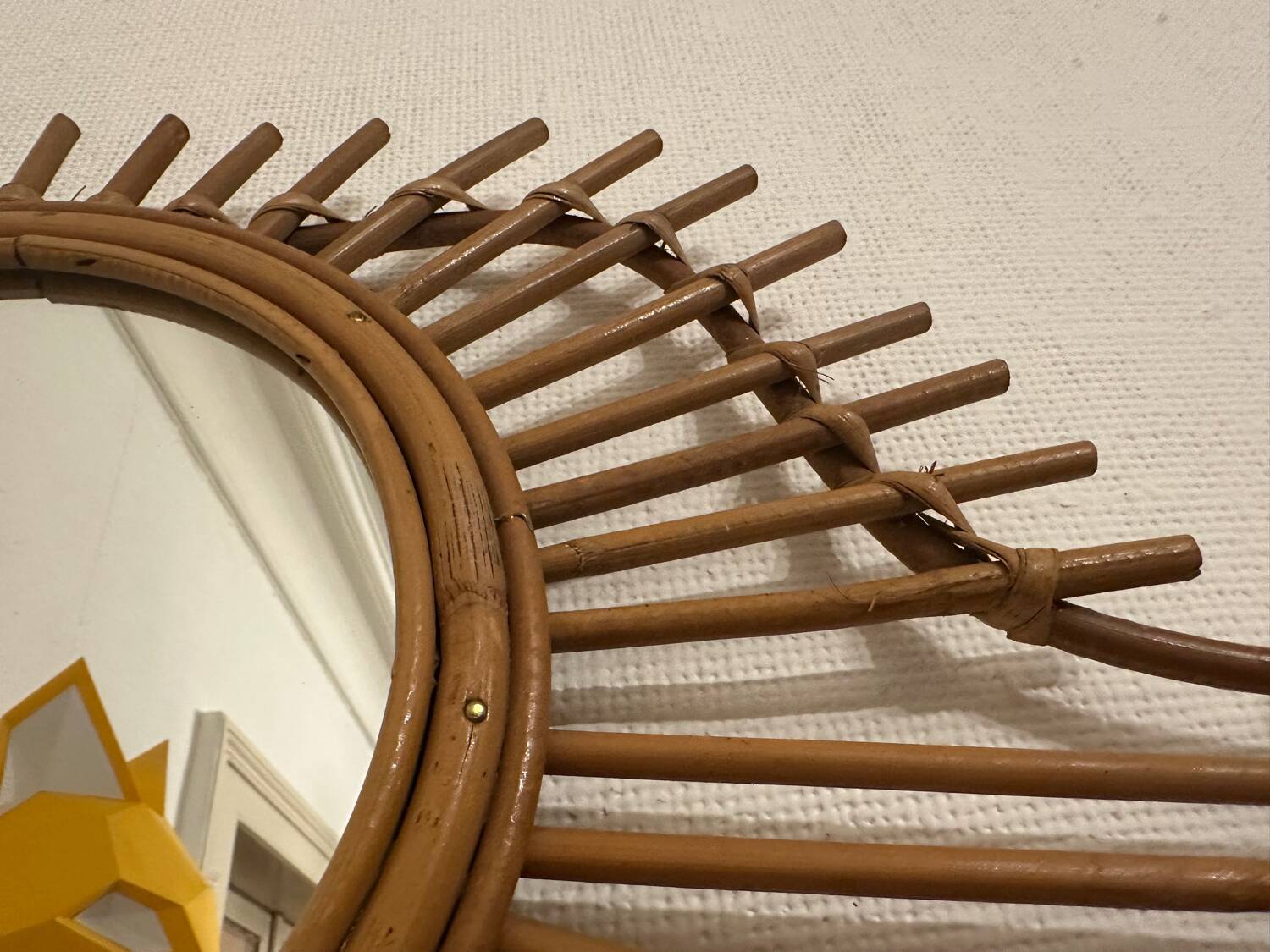Vintage guitar-shaped rattan mirror