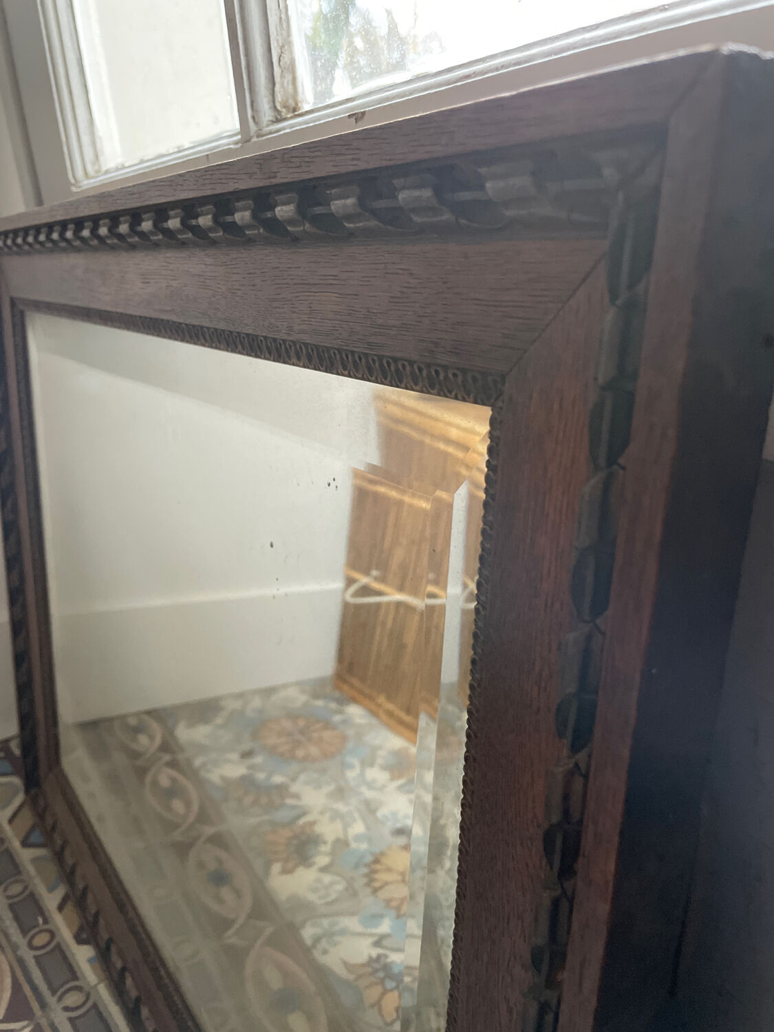 Carved beveled mirror