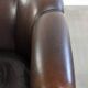 Set of a sheepskin sofa together with its matching club armchair