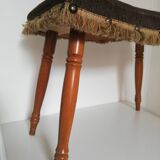Stool with studs and fringes