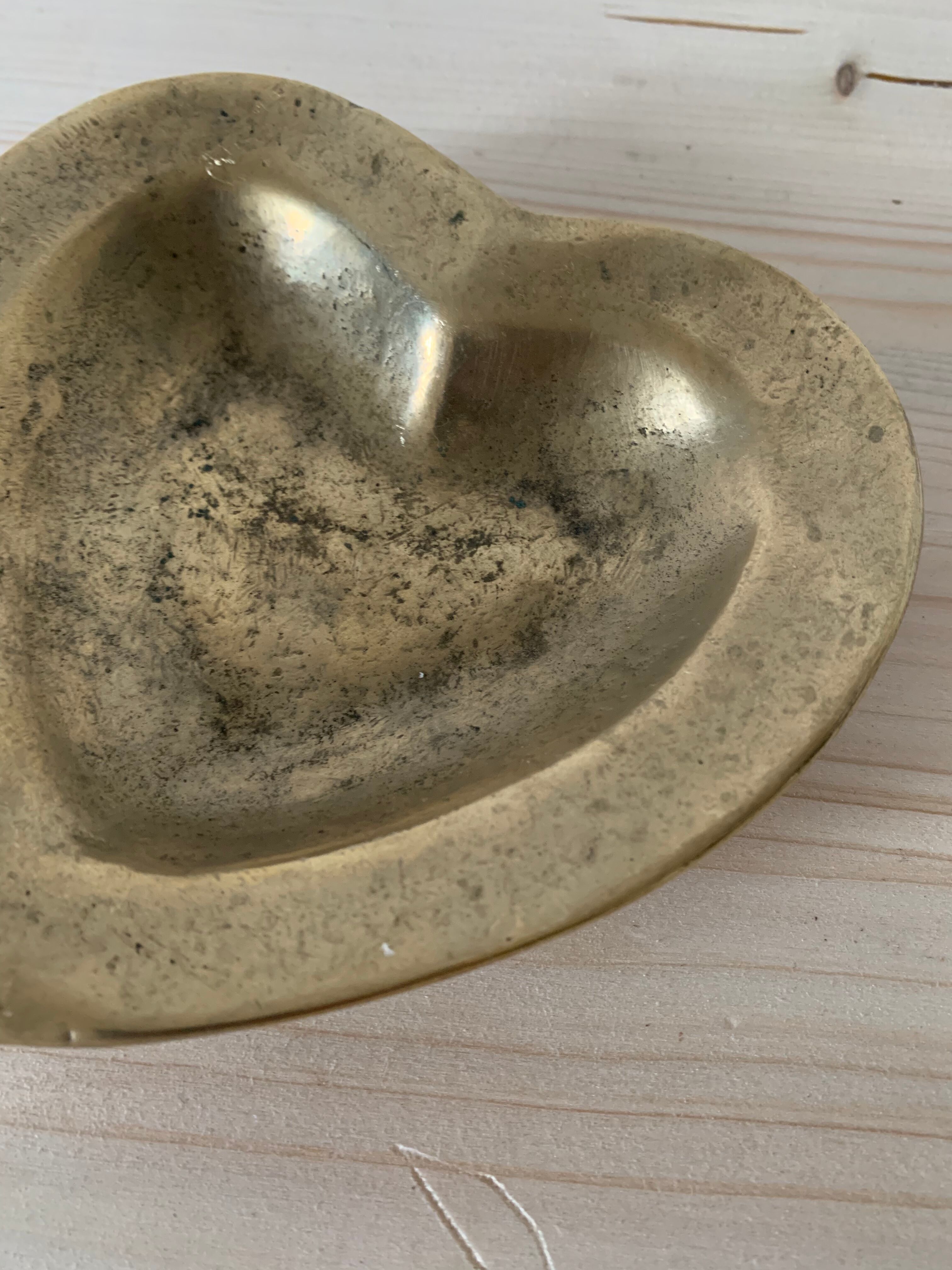 Empty bronze heart pocket