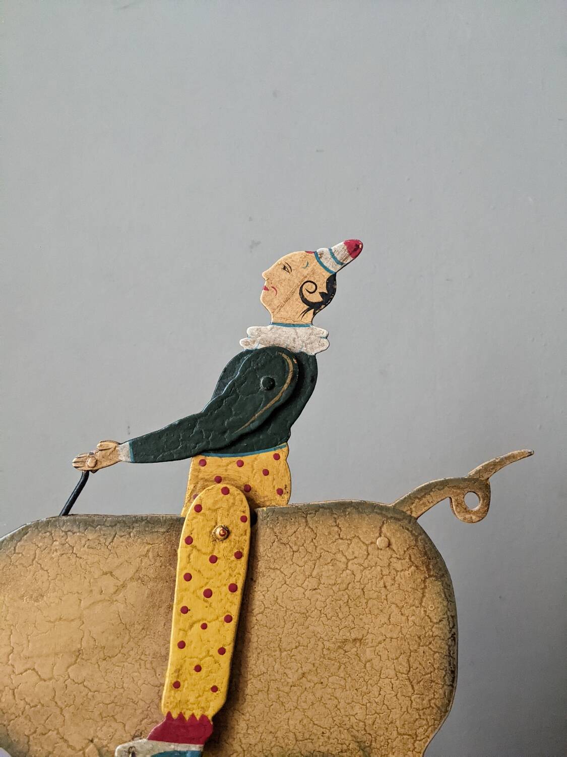 Antique pull toy, metal, hand-painted decoration, clown circus