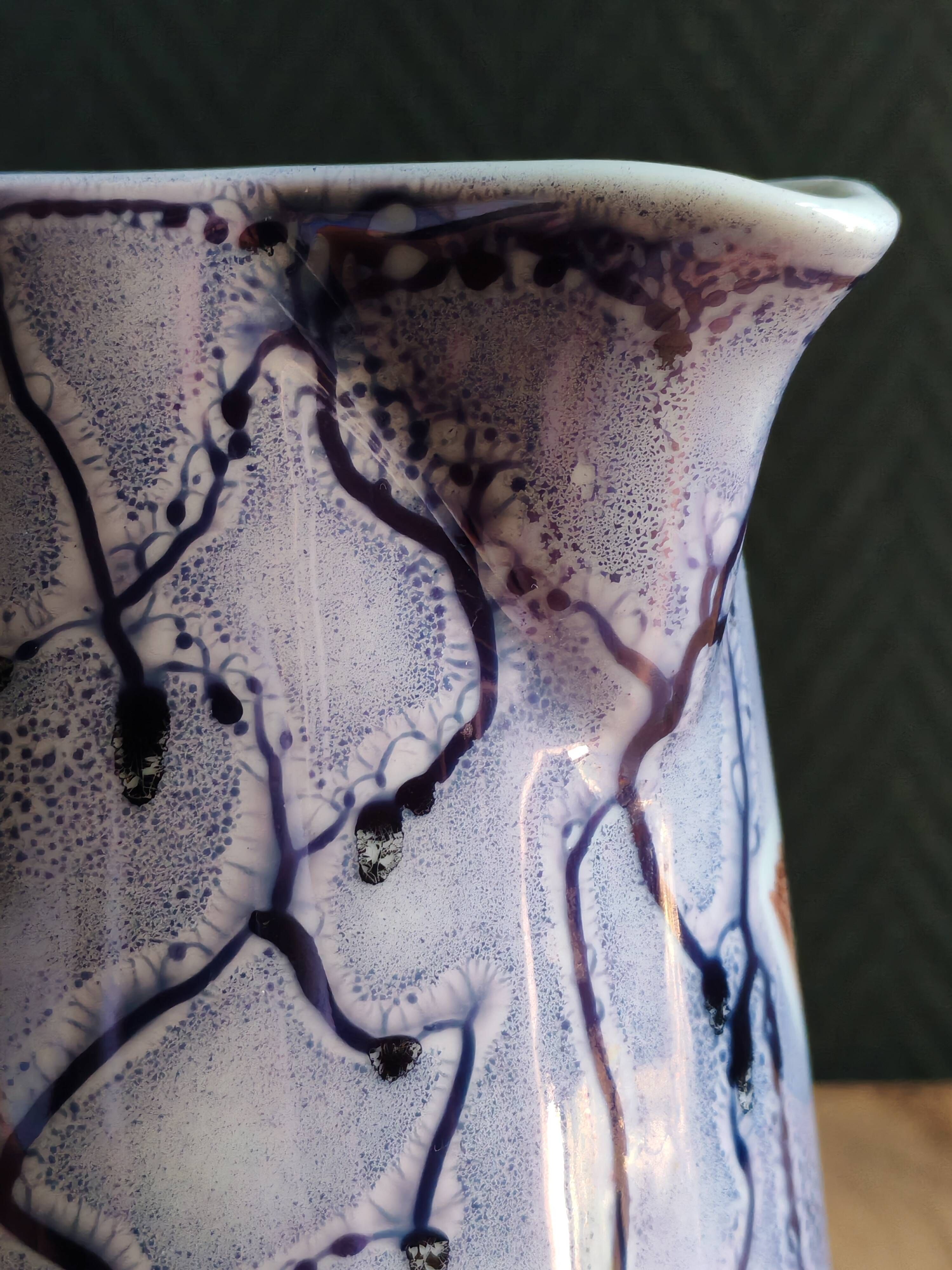 Vintage porcelain pitcher Lusseray France, decorated with grape clusters.