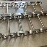 Series of 12 vintage stainless steel knife holders