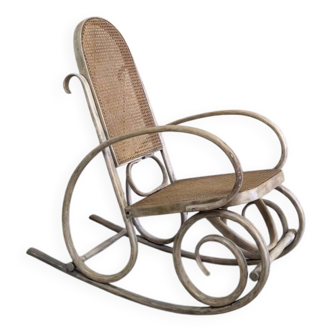 Rocking chair in curved beech and cane