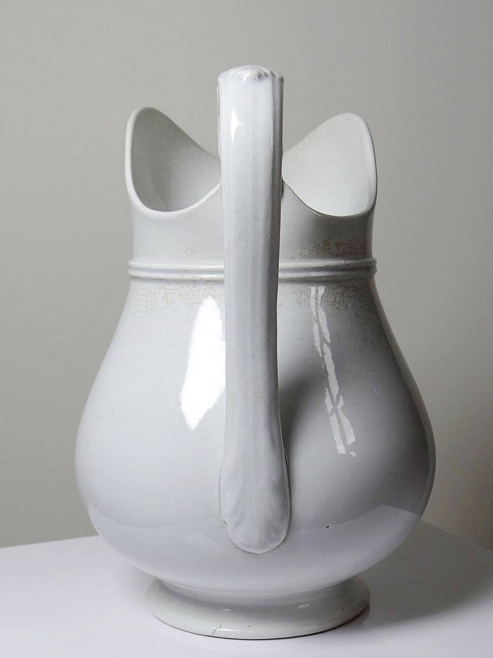 Antique white earthenware toilet jug from Pexonne, France