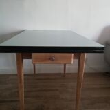 Table with formica extensions and oak