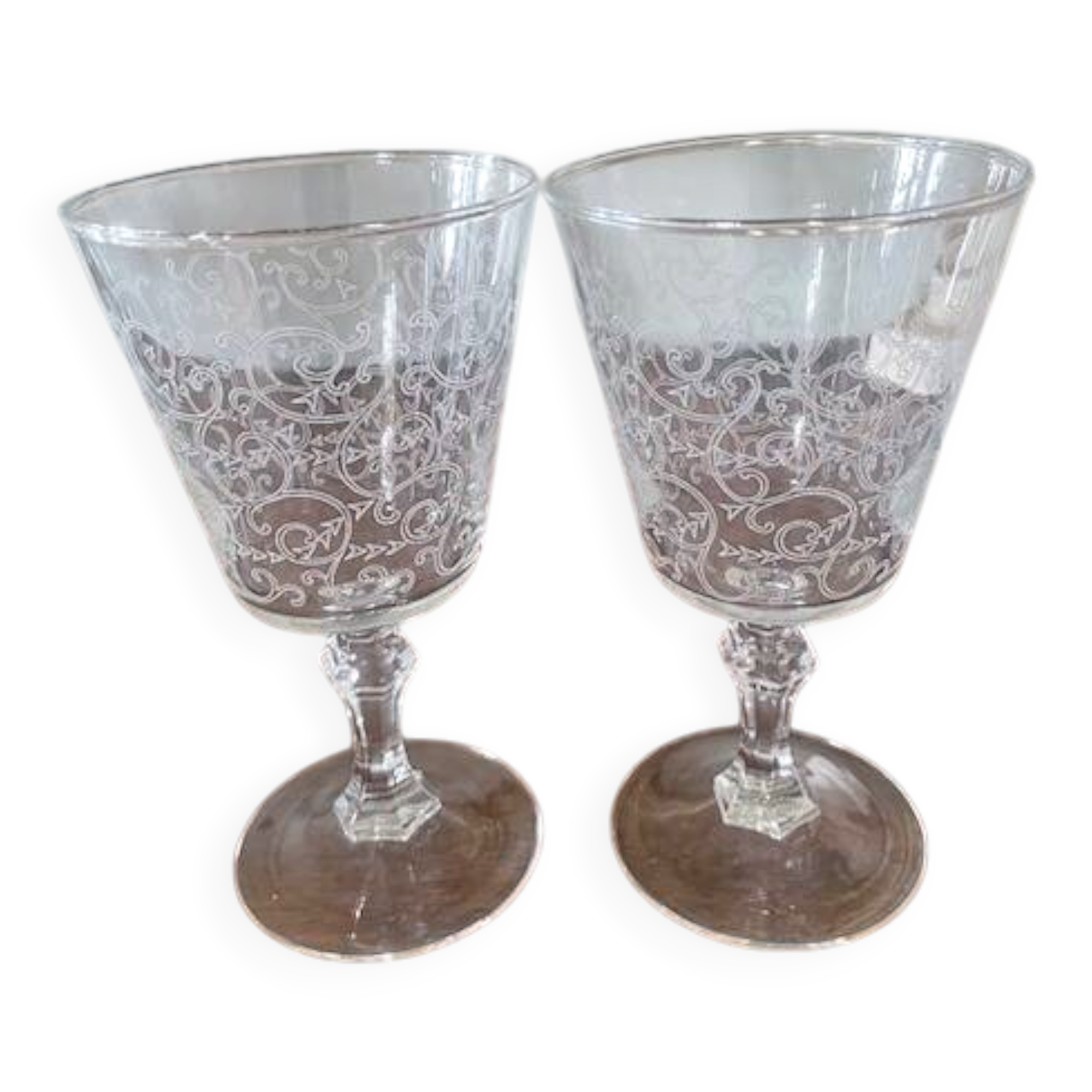 2 large engraved water glasses in arabesque.