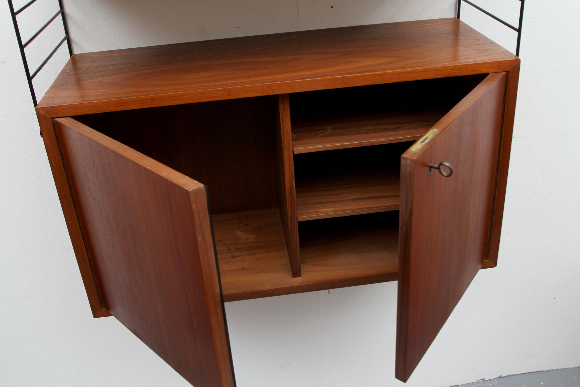 Wall unit in teak by Nisse Strinning