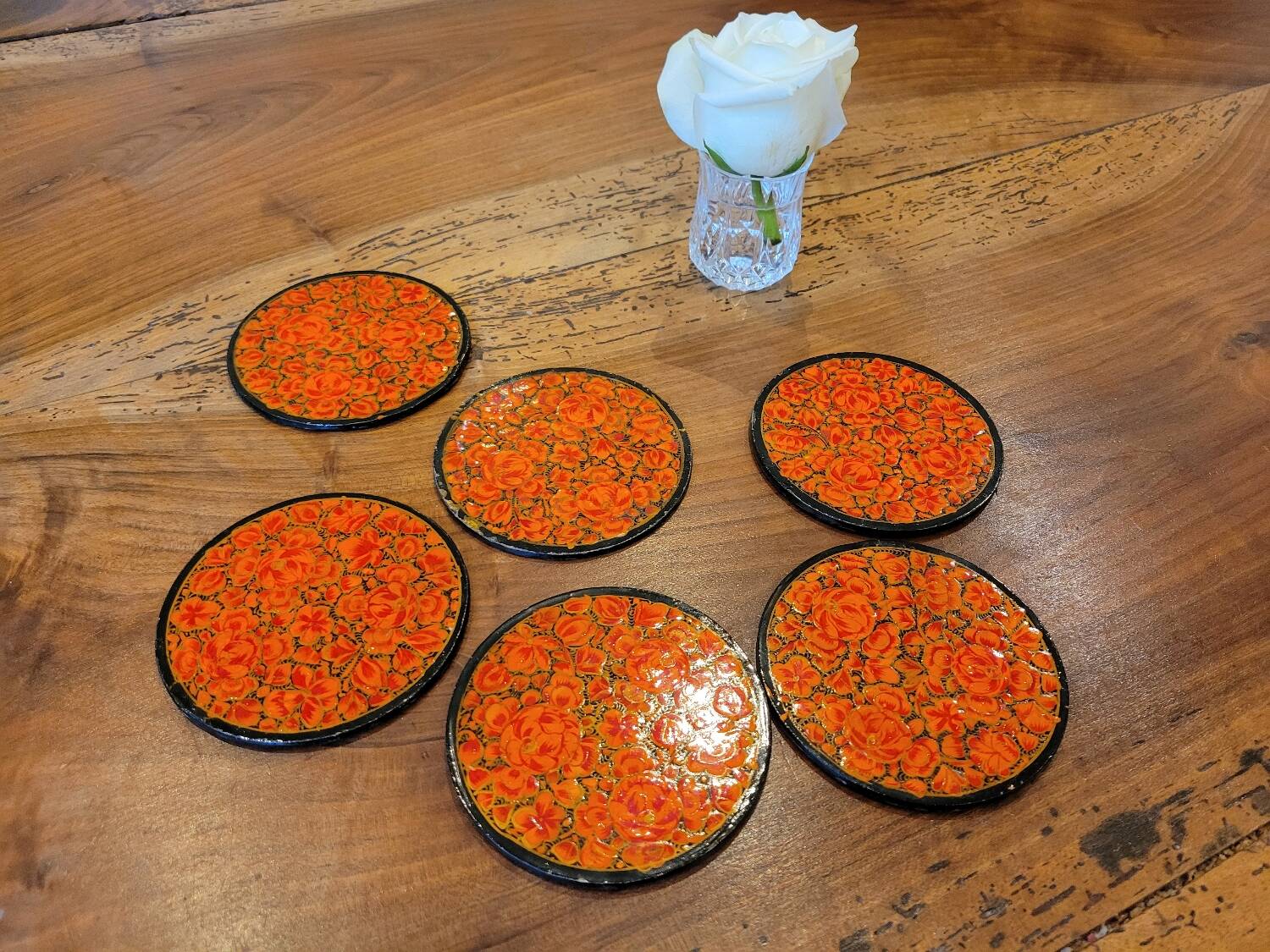 Under a painted wooden frame