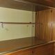 1960s teak veneer secretary with sliding display cabinet.