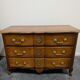 Louis XV crossbow commode in walnut, three drawers, 18th century.