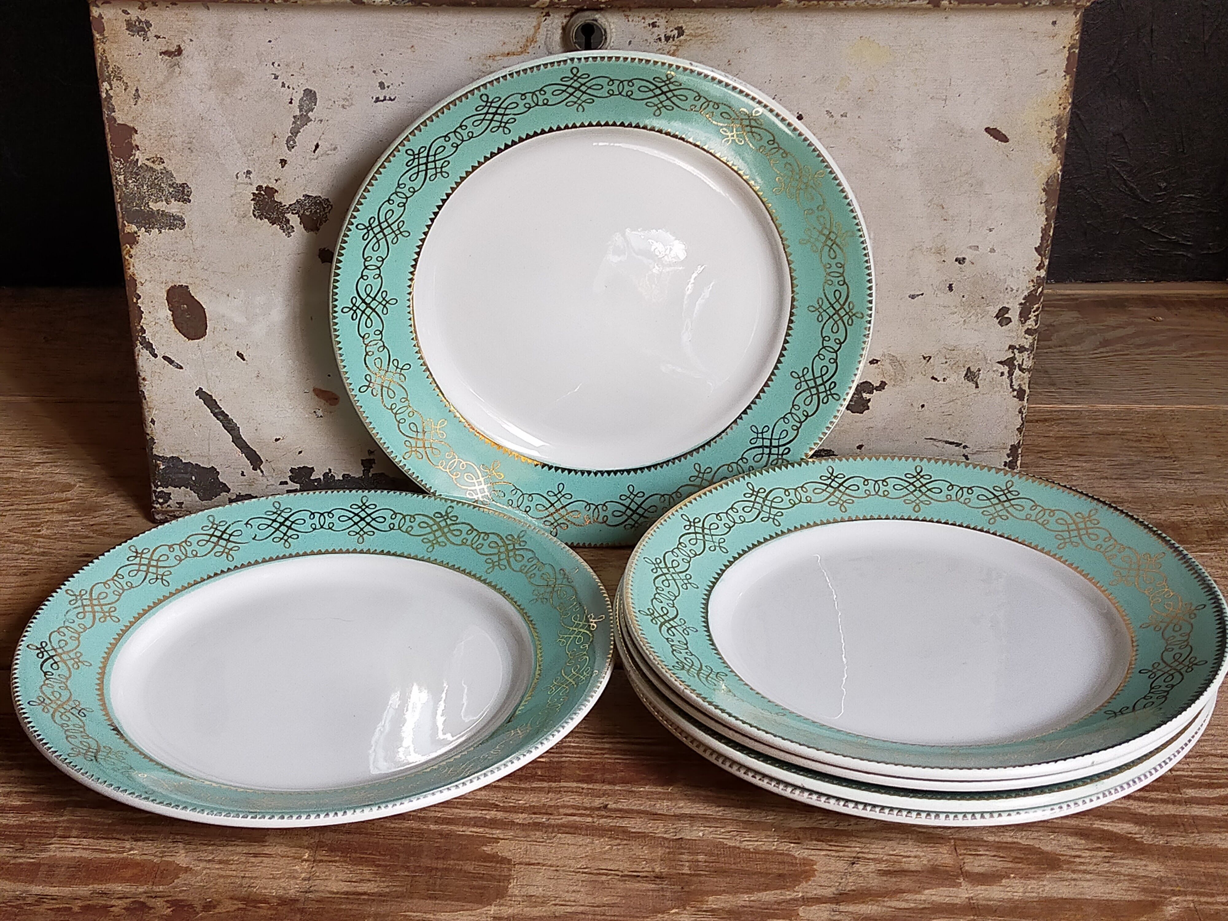 Six plates of vintage Badonviller earthenware with gold frieze