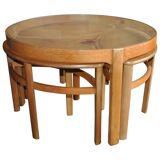 Nest tables in blonde teak with glass tops by Nathan, 1960s (set of 3)