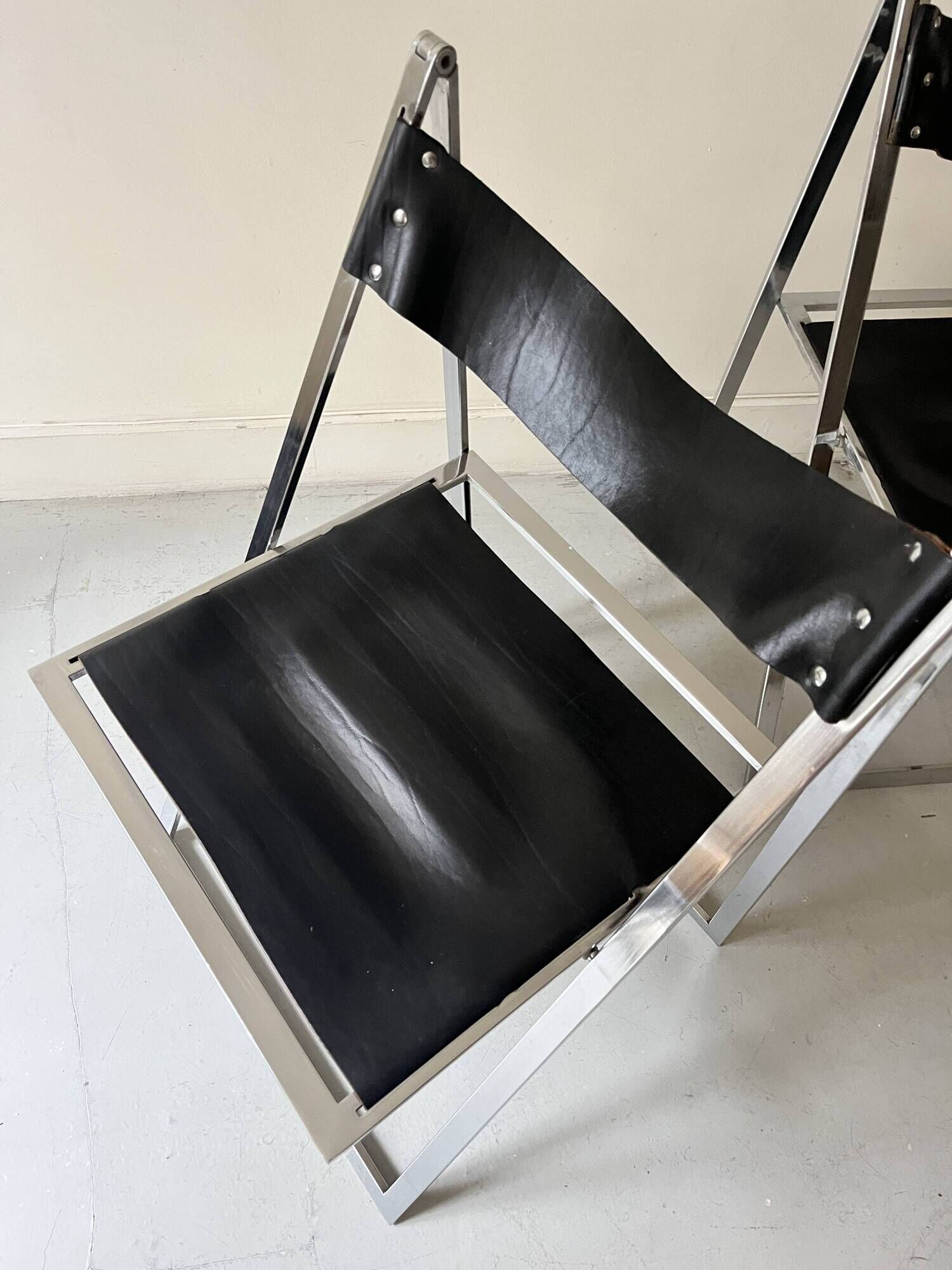 Set of 2 folding chairs in leather and chrome model Elios by Fontini & Geraci, Italy 1970