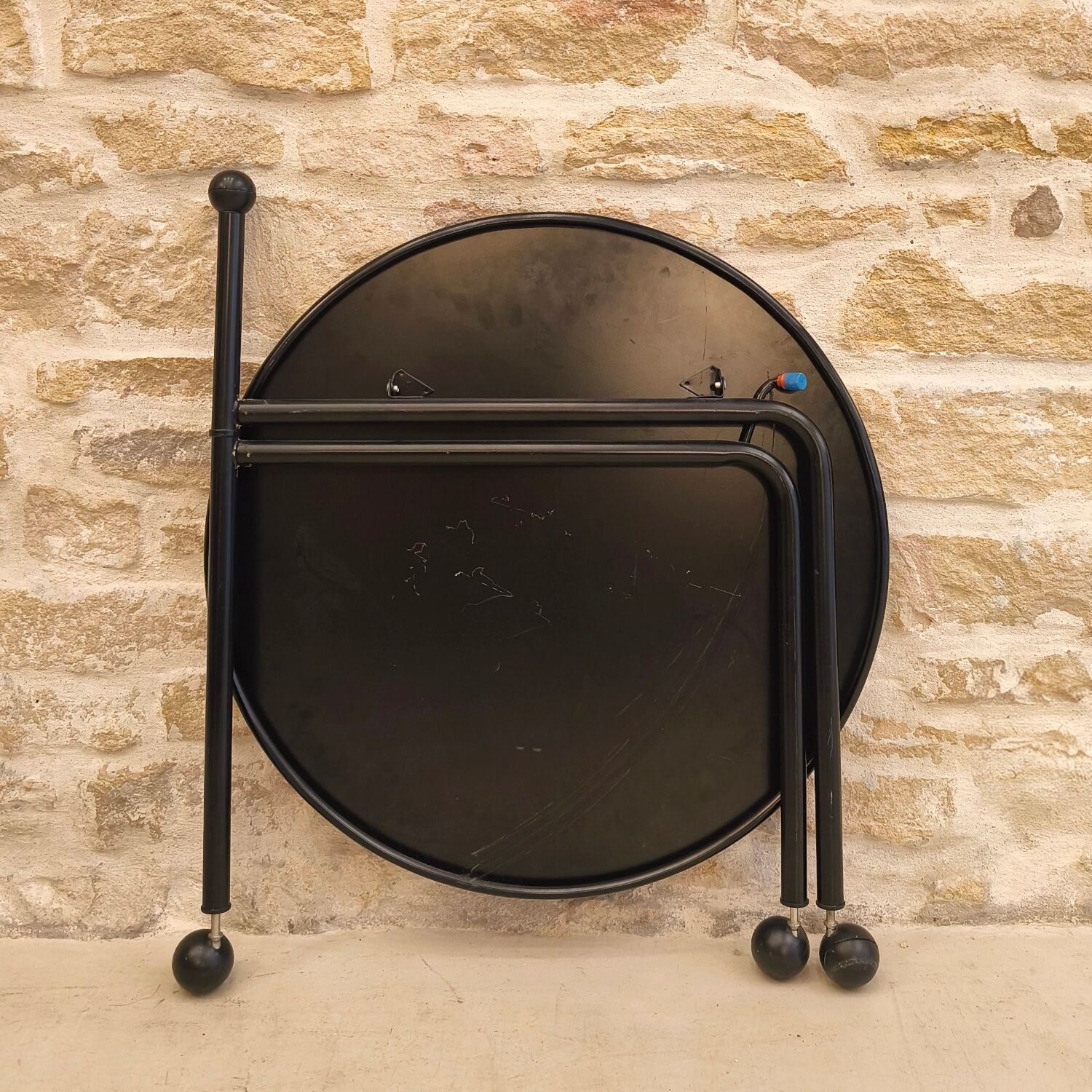 Foldable metal side table, design by Tord Bjorklund, Ikea.