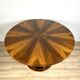 Round walnut table in Art Deco style "Praha". Manufacturer