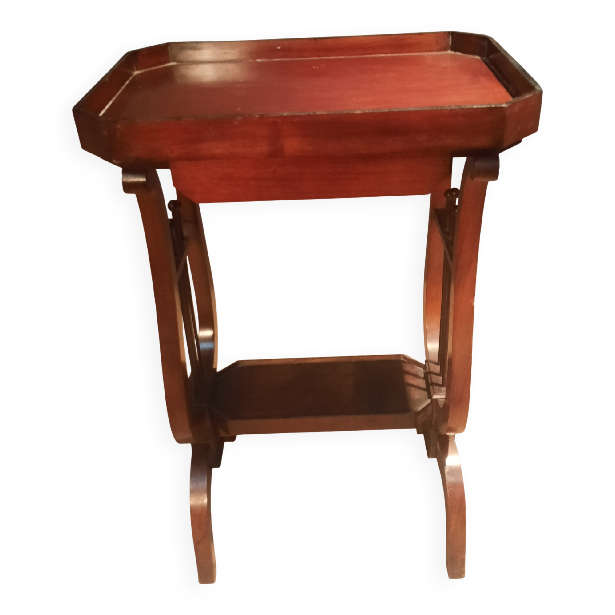 19th-century worker with a lyre footstool.