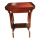 19th-century worker with a lyre footstool.