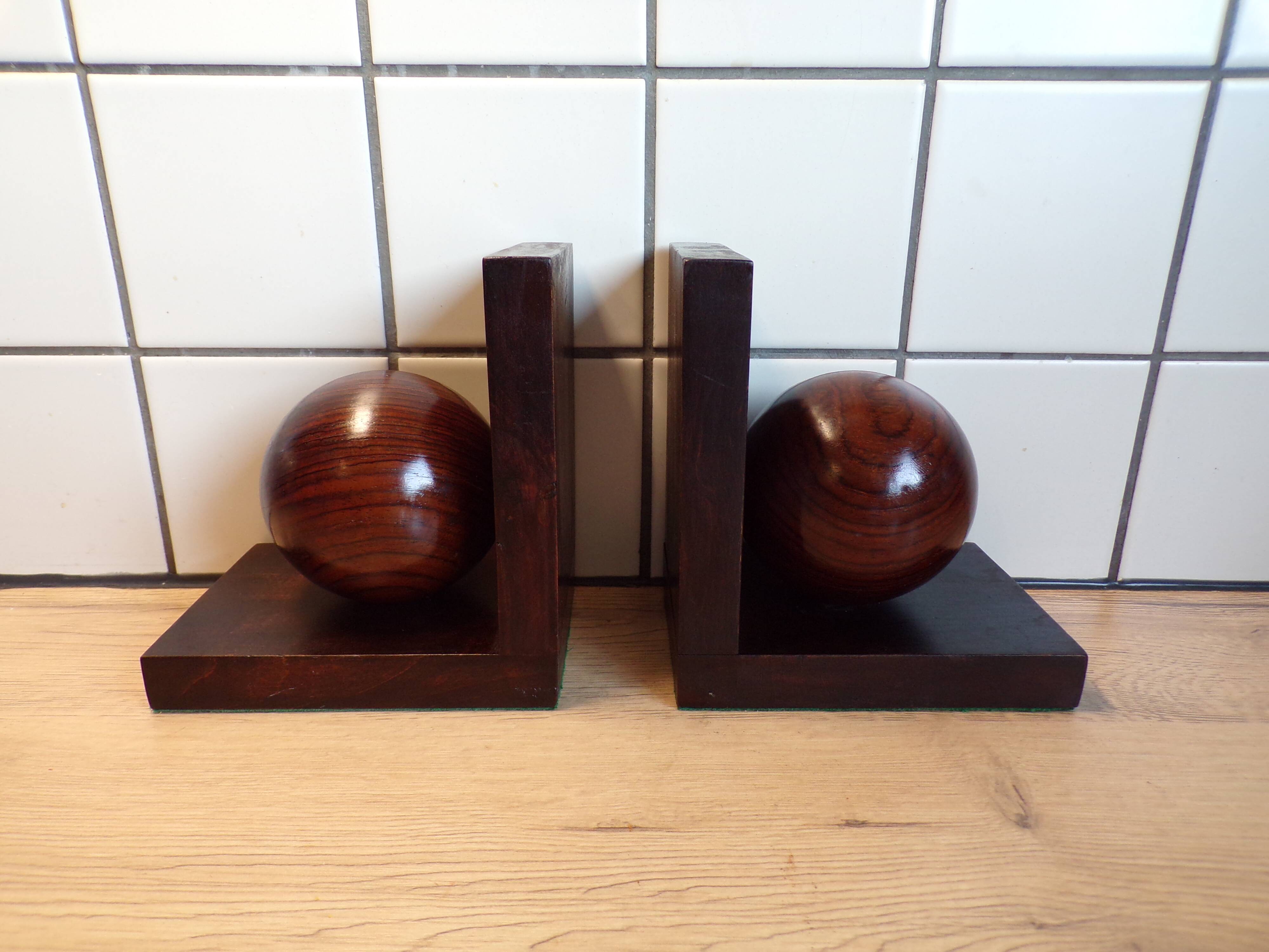 Paire de serre-livres art déco boule bois