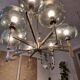 Timeless modern Scandinavian / mid-century chandelier in chrome and smoked glass.