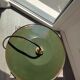 Old suspension in green enamelled sheet metal